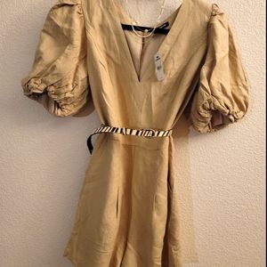 NWT. Tan Express puffed sleeve romper